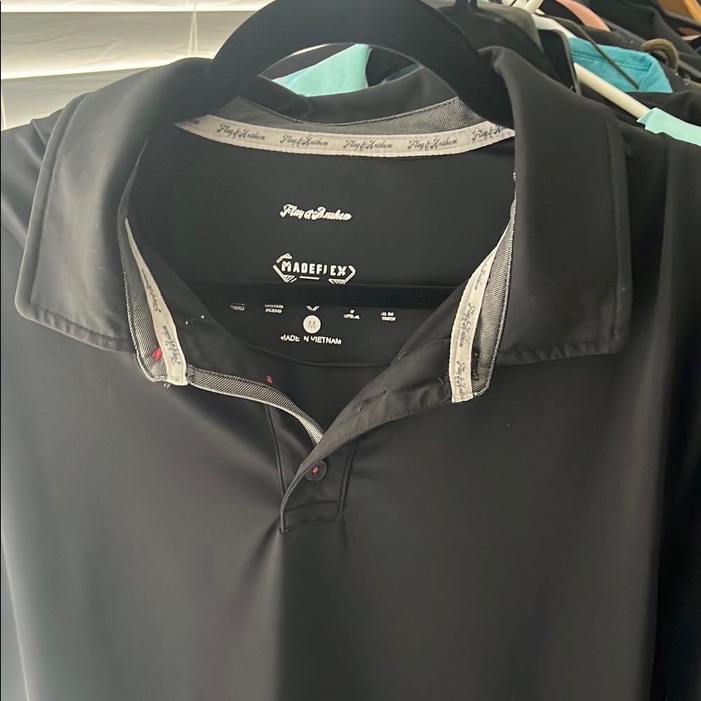 Flag & Anthem Black Polo Shirt with Classic Collar and Smooth Material